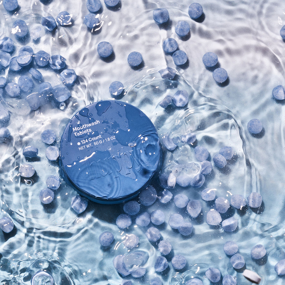 Person using alcohol-free mouthwash for a healthy oral care routine